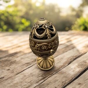 Rotating Wind Up Musical Elephant In Bejeweled Metal Egg on a Stand 7” Works!.